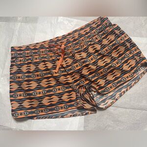 Patagonia Athletic Women Shorts with Orange and Black Pattern Size Xl.